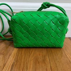 Bottega Veneta Mini Loop bag in “parakeet”.
